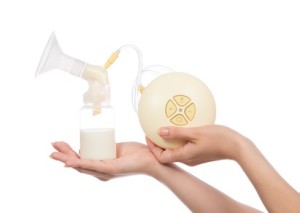 New compact electric breastpump to increase milk supply for breastfeeding mother isolated on white background