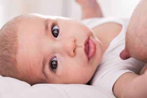 Beautiful innocence hungry baby sucking